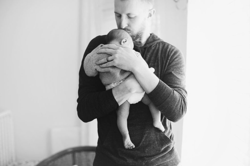father-holding-baby